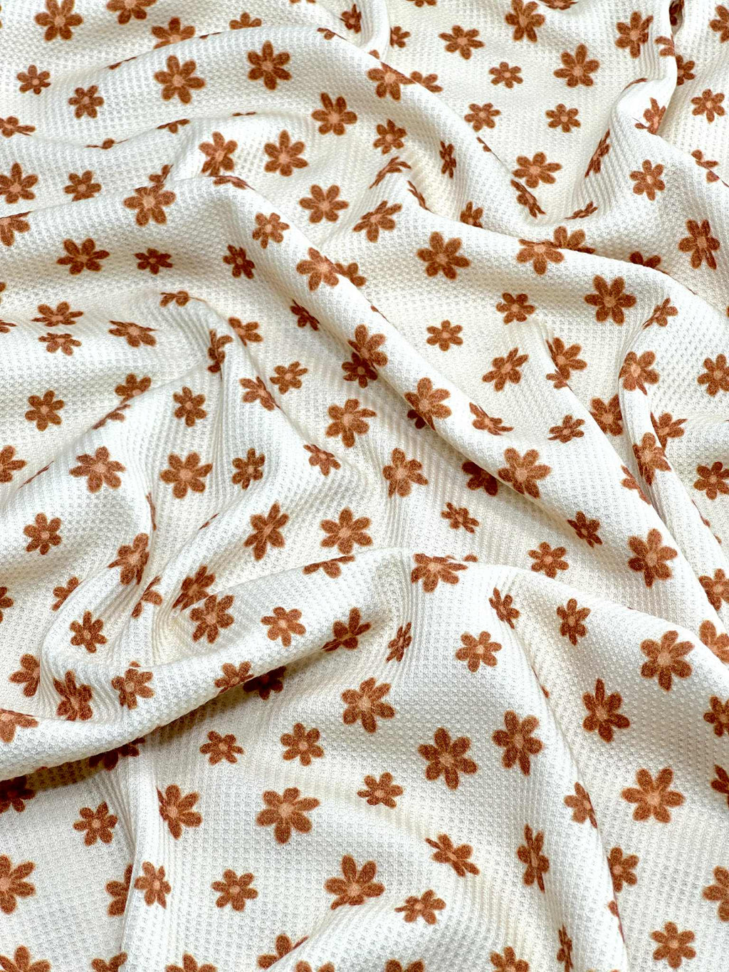 (THERMAL) TINY BURNT ORANGE FLOWERS ON CREAM
