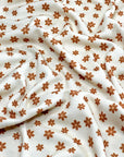 (THERMAL) TINY BURNT ORANGE FLOWERS ON CREAM