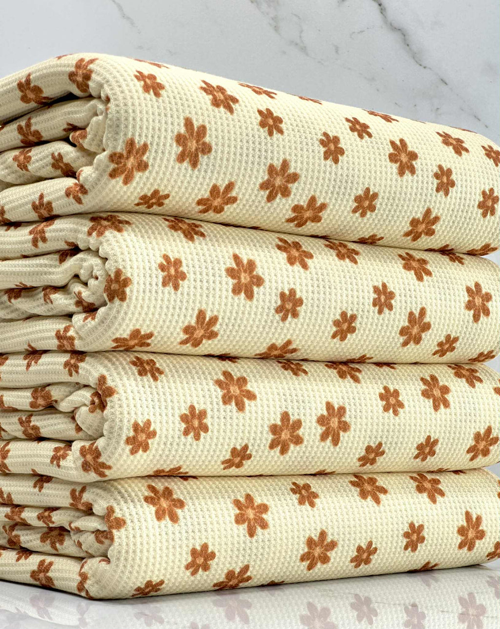 (THERMAL) TINY BURNT ORANGE FLOWERS ON CREAM