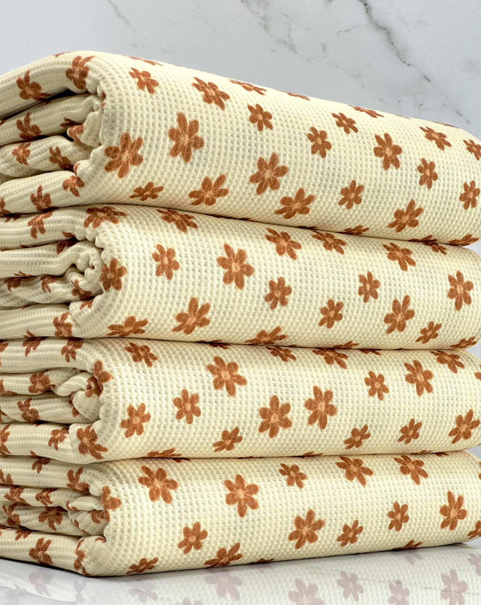 (THERMAL) TINY BURNT ORANGE FLOWERS ON CREAM