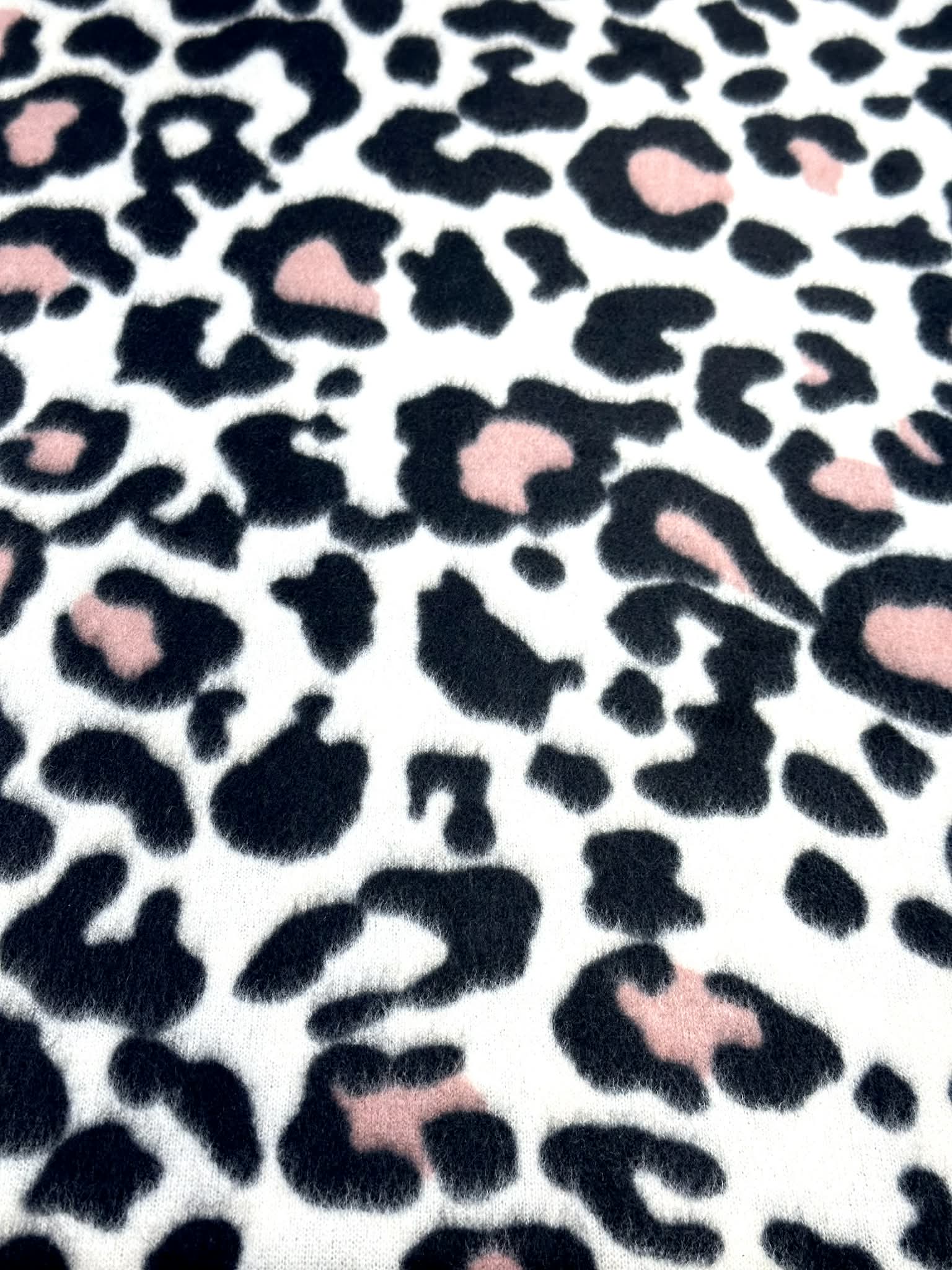 (BRUSHED SWEATER KNIT) BLACK AND CORAL CHEETAH ON OFF WHITE