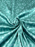 (SATIN) CHEETAH ON TEAL GREEN