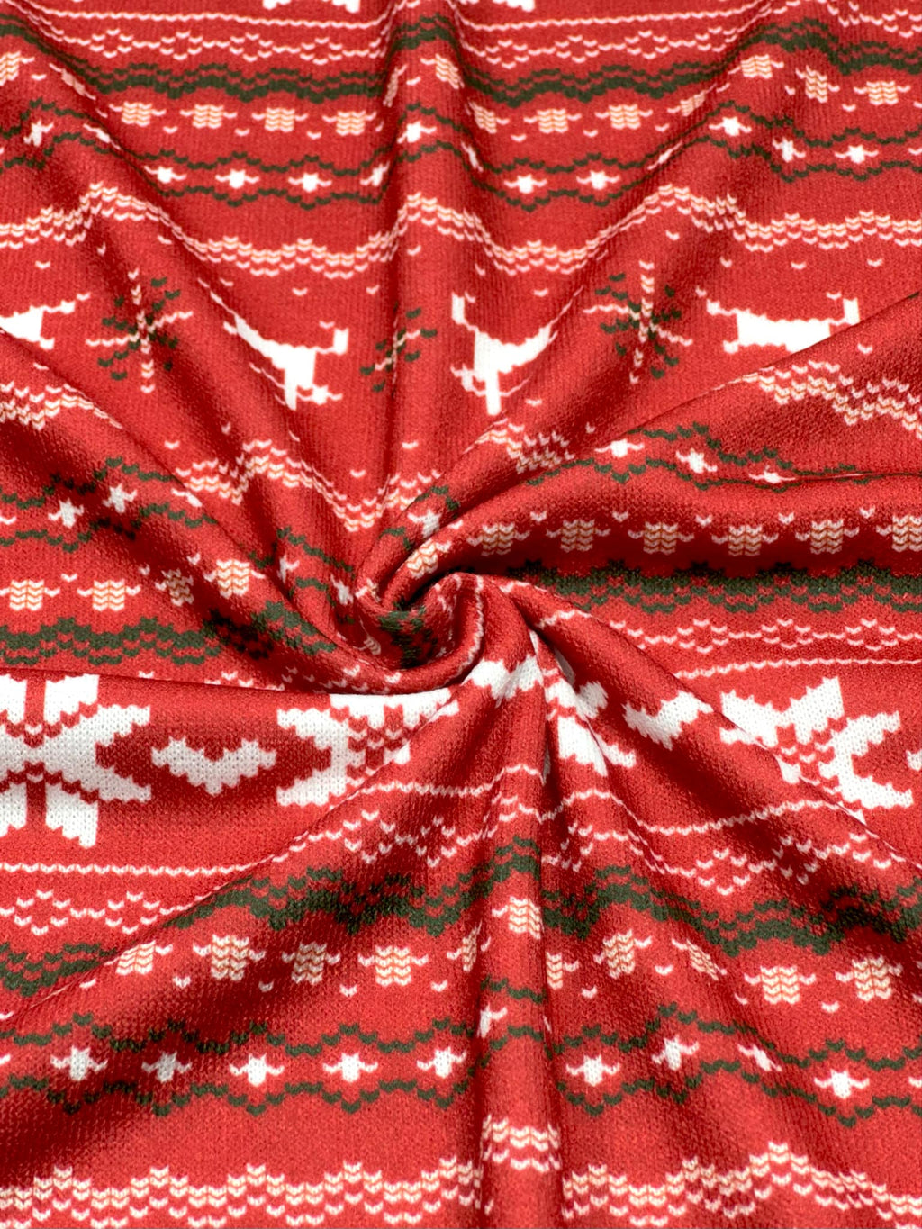 (SWEATER KNIT) OFF WHITE REINDEERS AND OFF WHITE POINSETTIA'S ON RED