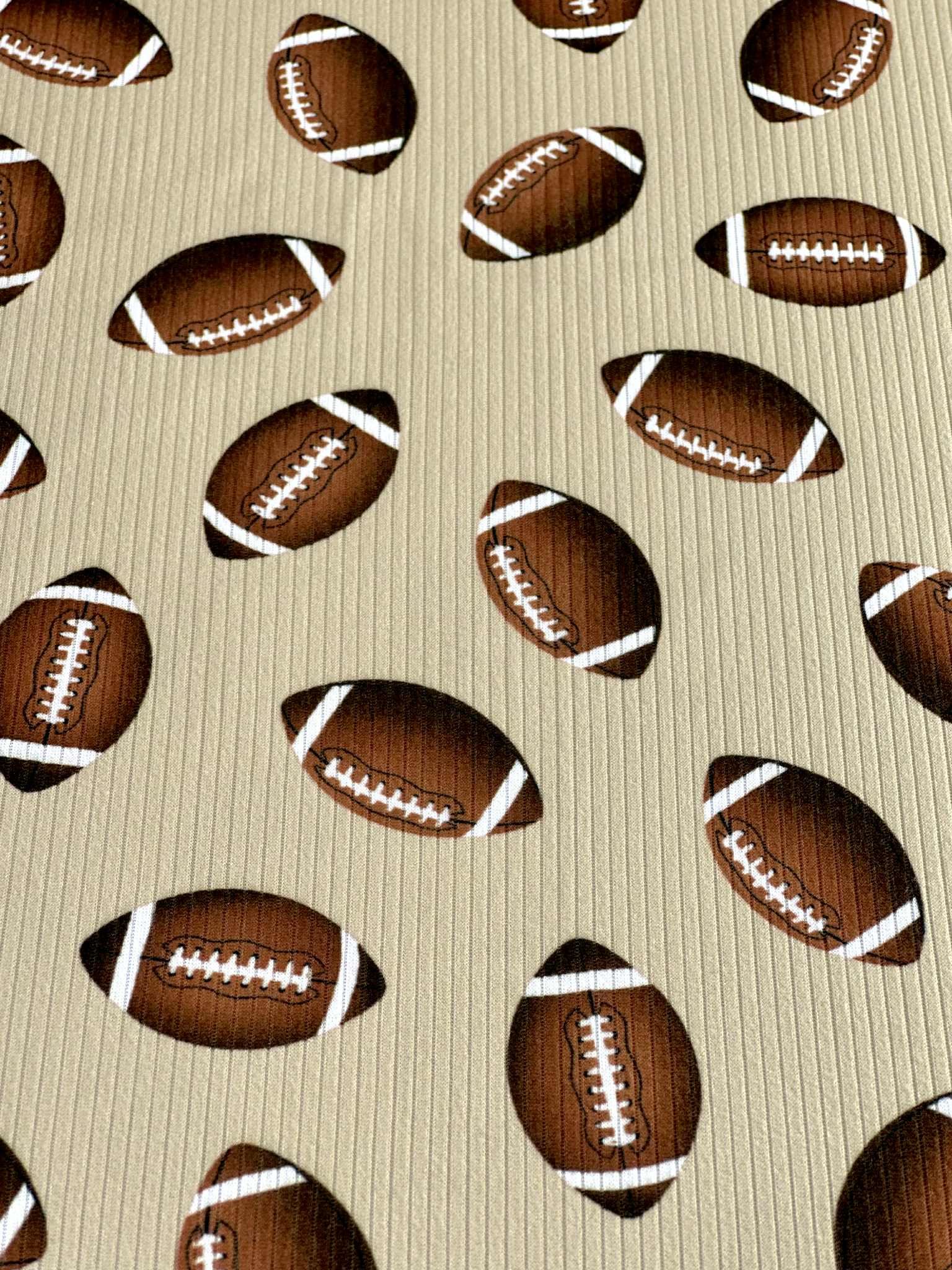 (4X2 RIB) FOOTBALLS ON TAN