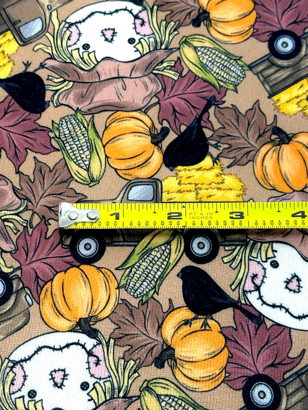 (SWEATER KNIT/OAKLEY) SMALL HAY TRUCKS, SCARECROWS & BLACK CROWS ON COFFEE (1)