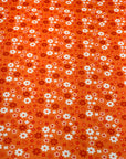 (2X2 YUMMY RIB) BURNT ORANGE AND OFF WHITE TINY FLOWERS ON ORANGE