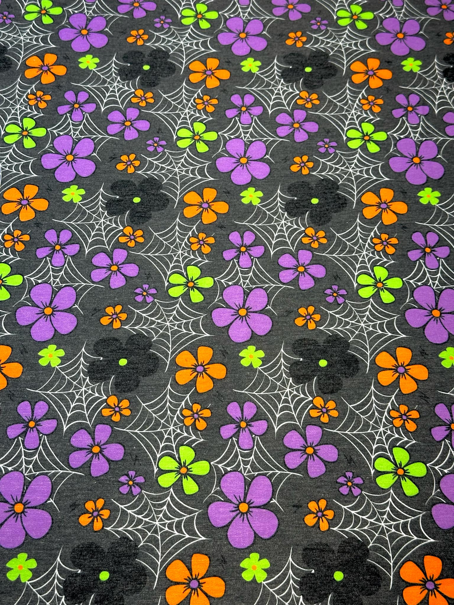 (FRENCH TERRY) SMALL COLORFUL FLOWERS & SPIDERWEBS ON CHARCOAL