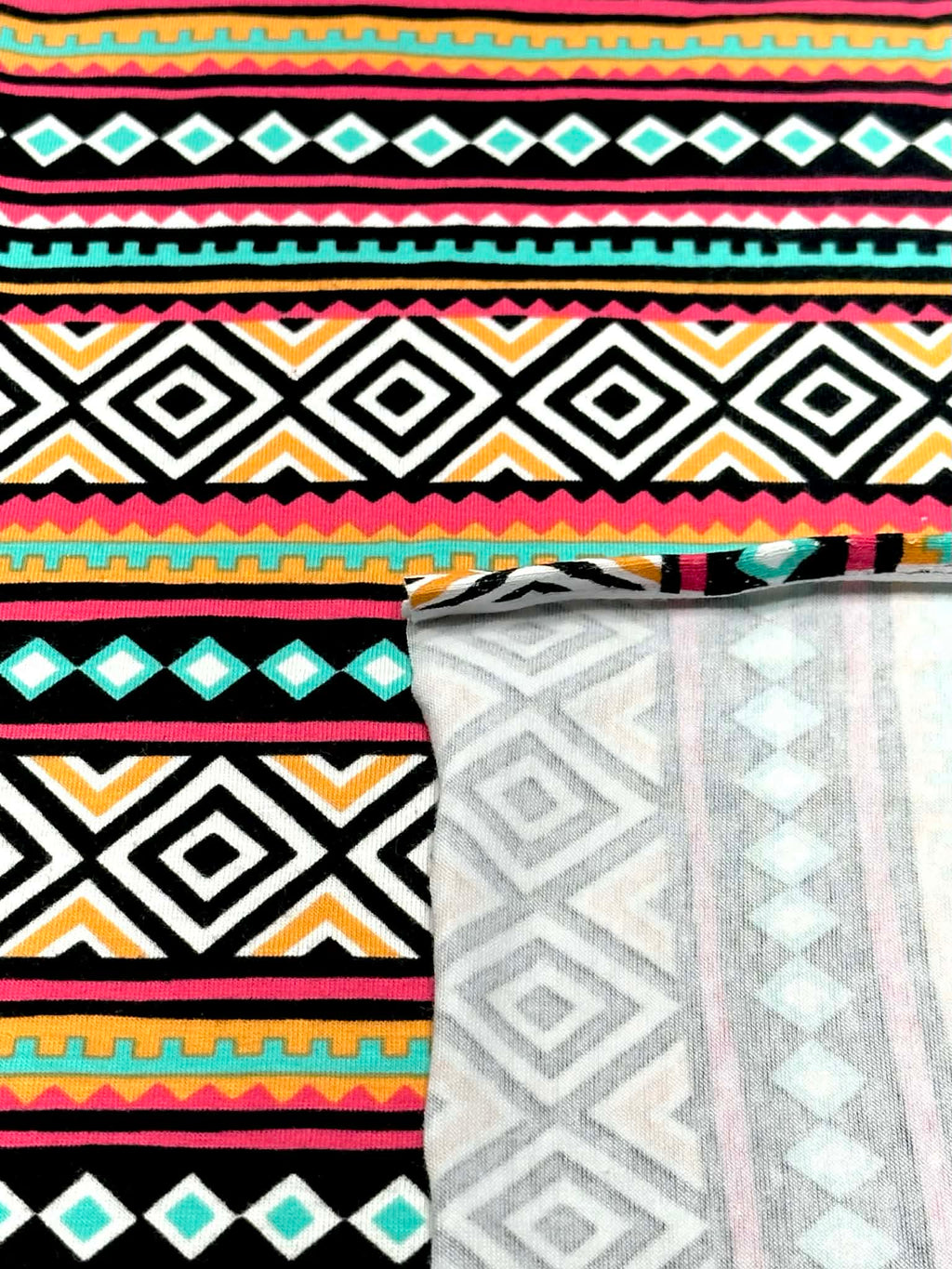 (KNIT) ORANGE, PINK, AQUA, AND BLACK DIAMOND PATTERN