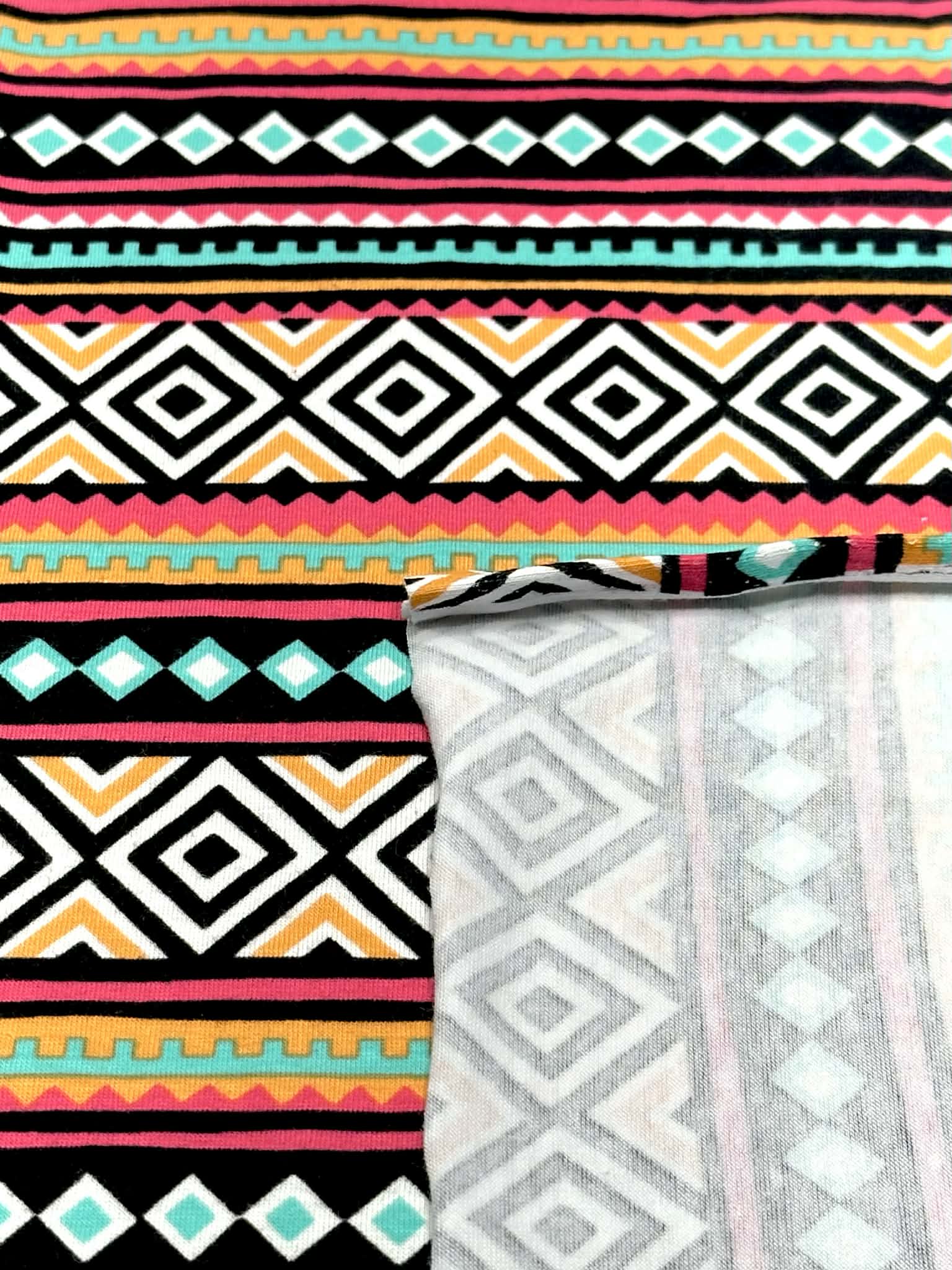 (KNIT) ORANGE, PINK, AQUA, AND BLACK DIAMOND PATTERN
