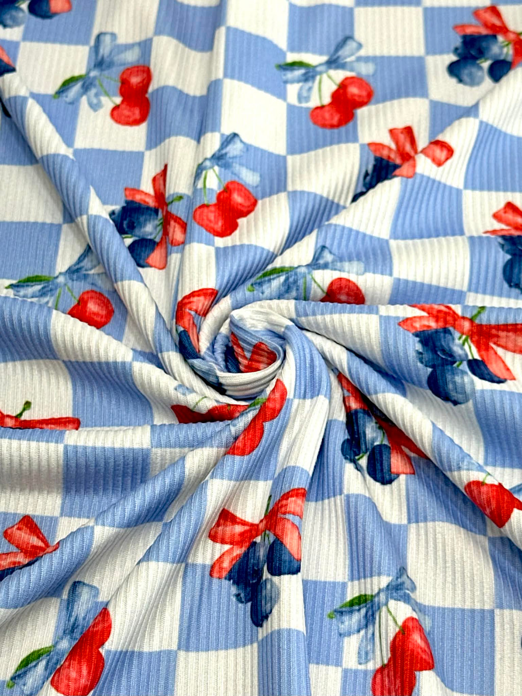 (2X2 YUMMY RIB) CHERRIES AND BLUEBERRIES WITH BOWS ON BLUE AND OFF WHITE CHECKERED