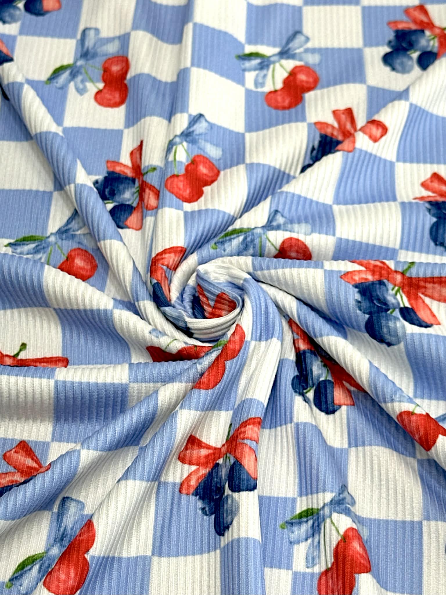(2X2 YUMMY RIB) CHERRIES AND BLUEBERRIES WITH BOWS ON BLUE AND OFF WHITE CHECKERED