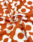 (FRENCH TERRY) IVORY DAISIES ON BURNT ORANGE