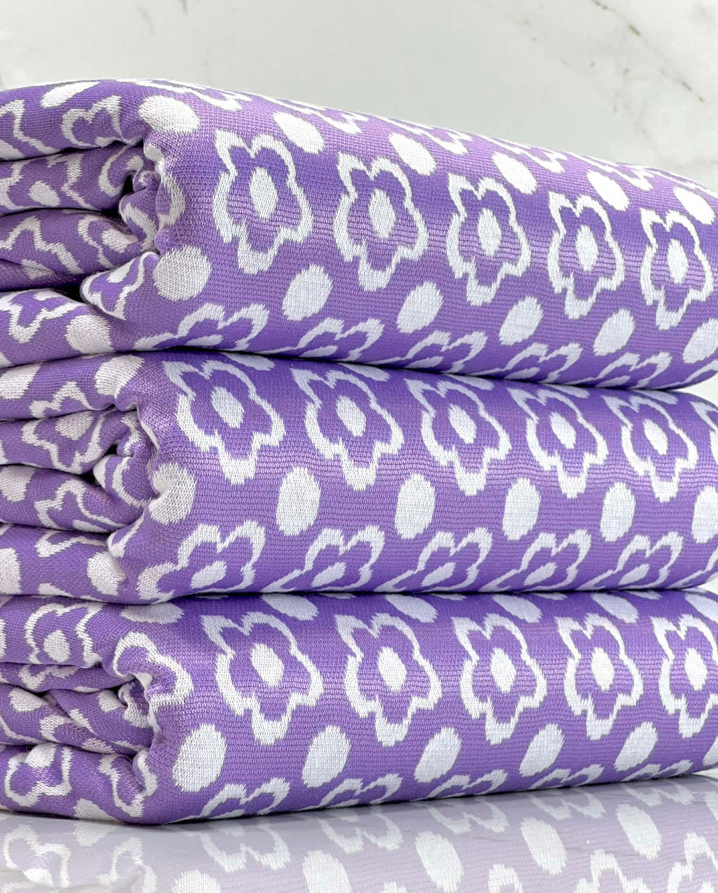 (DOUBLE KNIT) WHITE FLOWERS ON LAVENDER