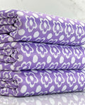 (DOUBLE KNIT) WHITE FLOWERS ON LAVENDER