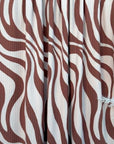 (WIDE RIB) BROWN SWIRLS ON TAN