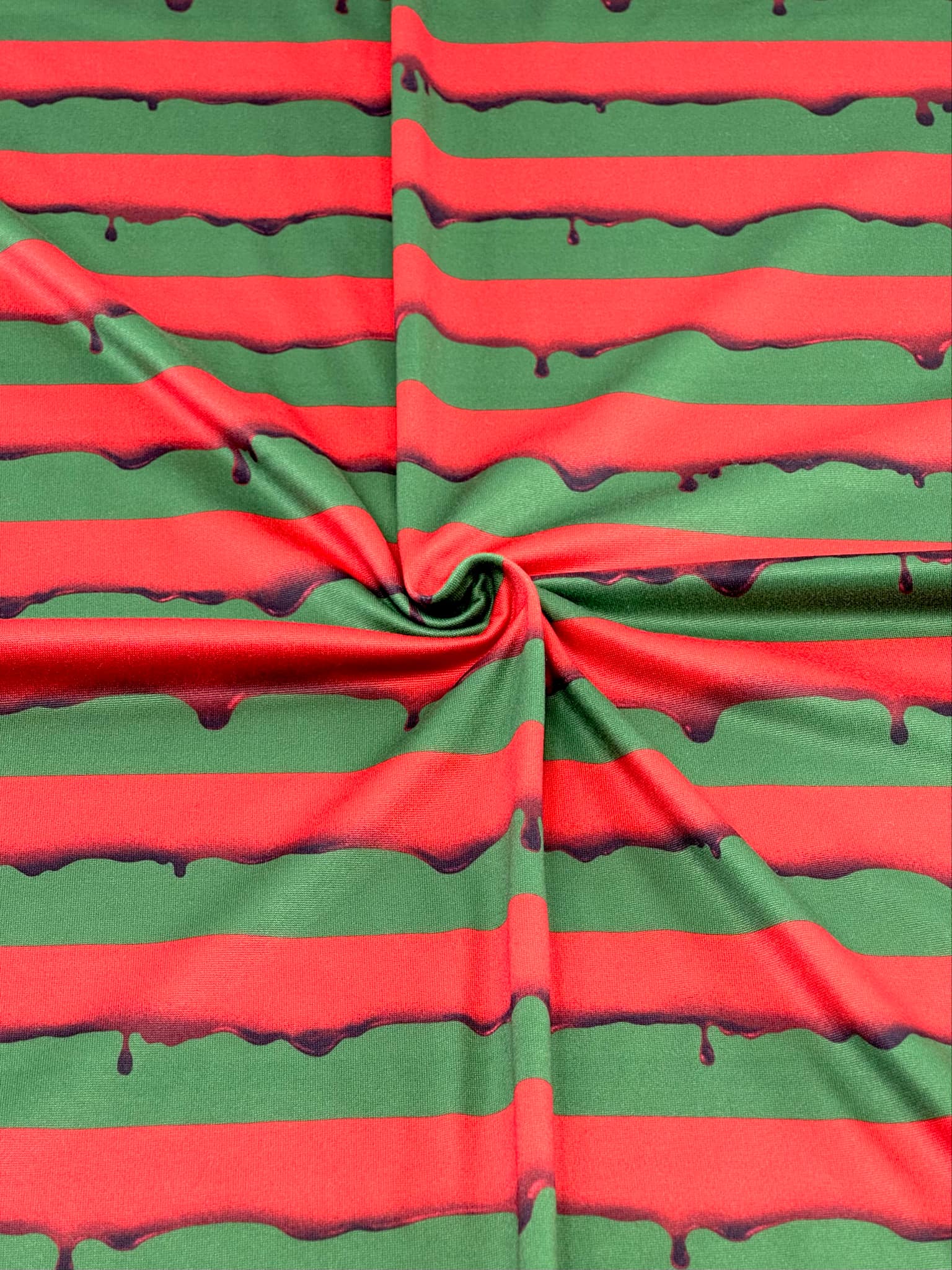 (DBP) DRIPPING RED BLOOD ON DARK OLIVE
