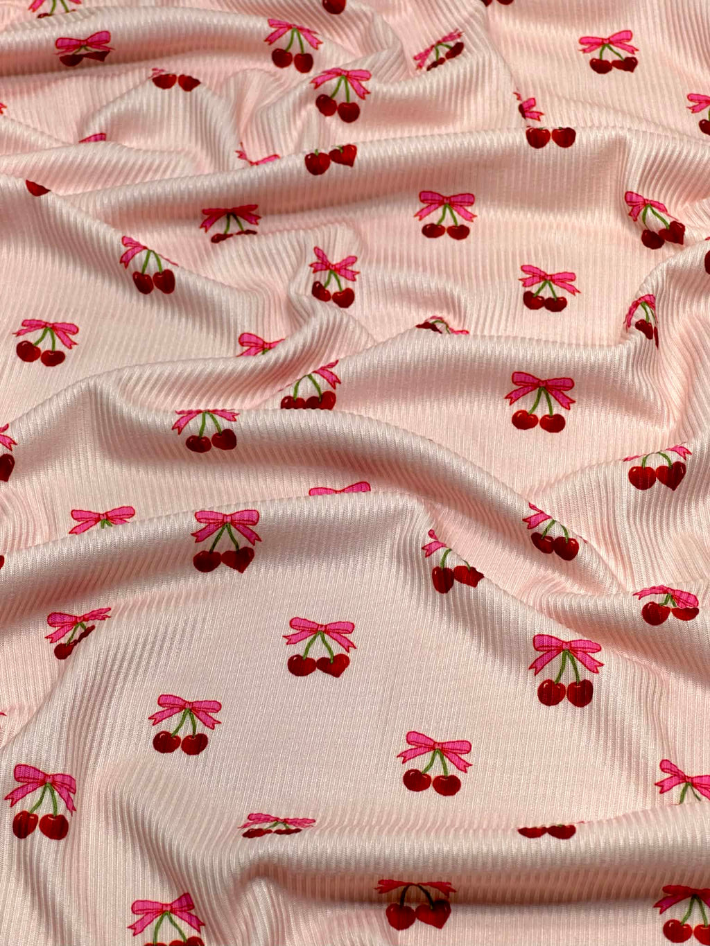 (2X2 BRUSHED RIB) CHERRY HEART WITH BOWS ON BLUSH