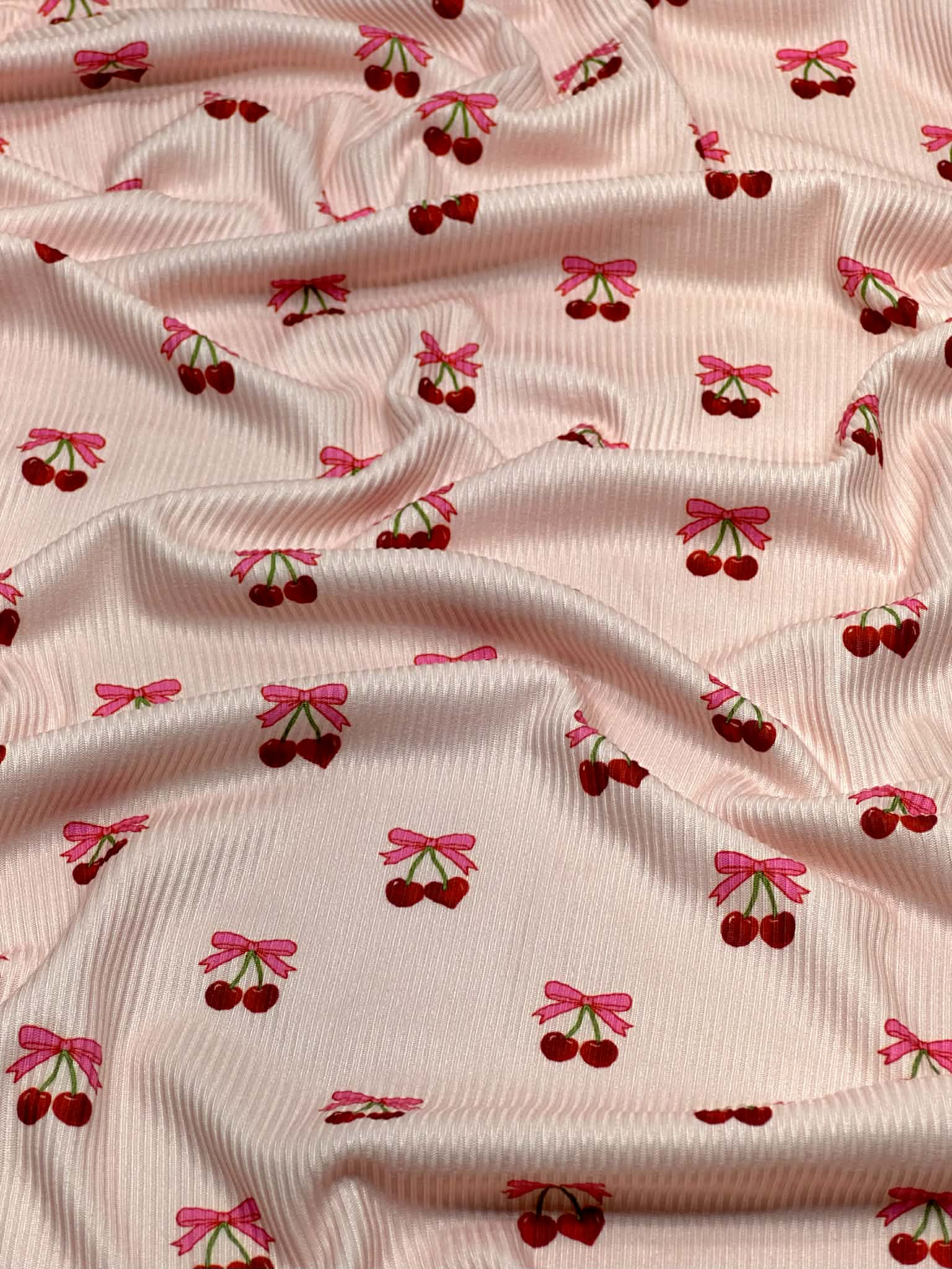 (2X2 BRUSHED RIB) CHERRY HEART WITH BOWS ON BLUSH