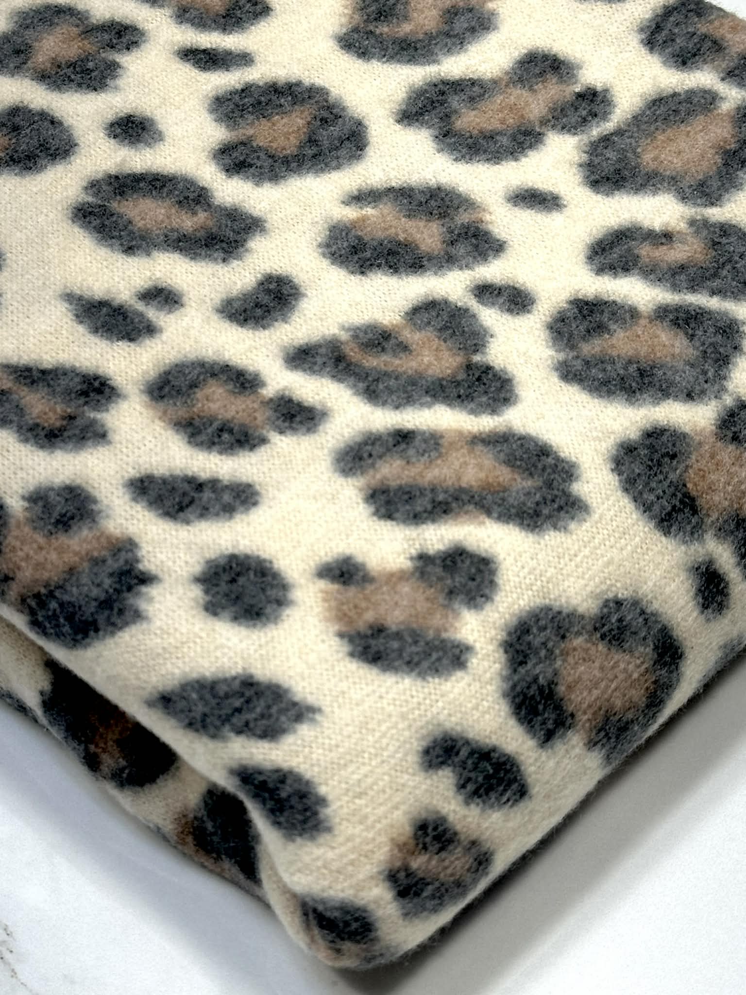 (BRUSHED SWEATER KNIT) BLACK AND BROWN CHEETAH ON CREAM